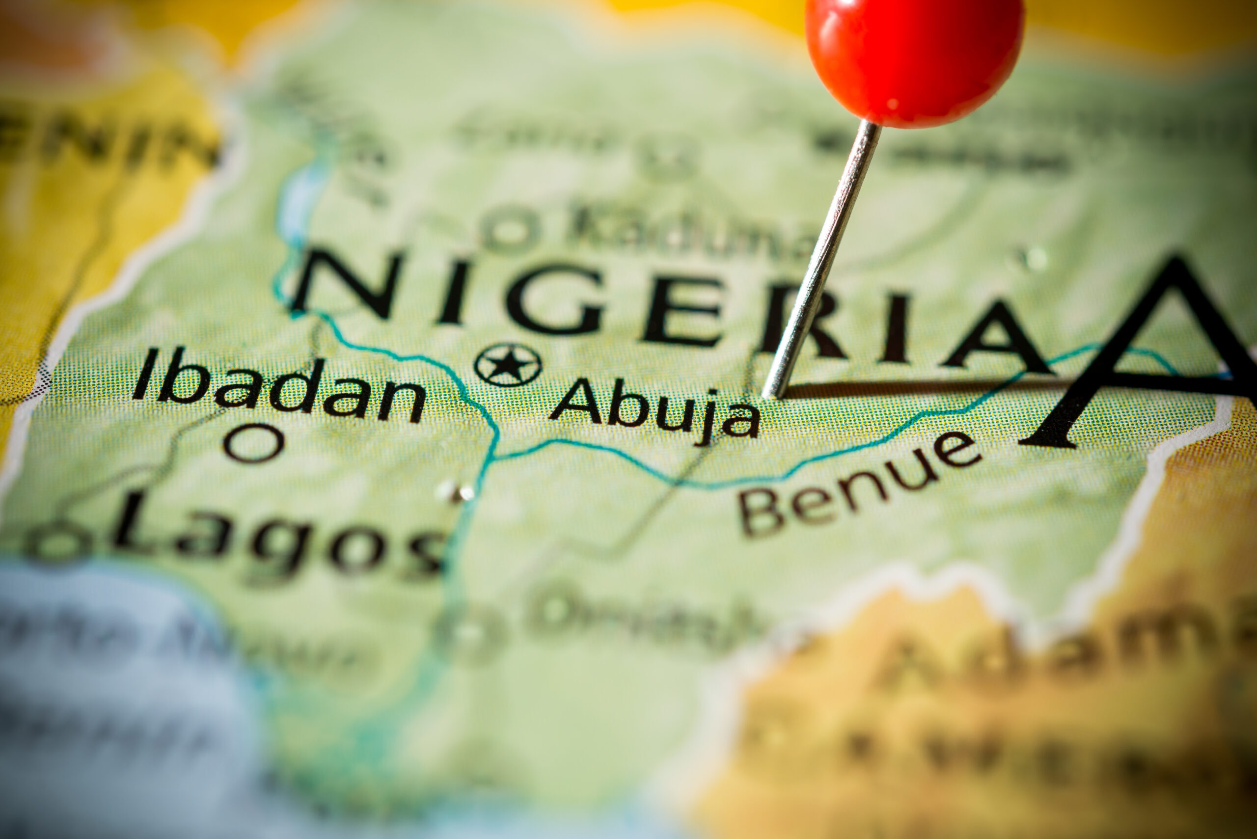 Colored map of a red pin centered on Abuja, Nigeria